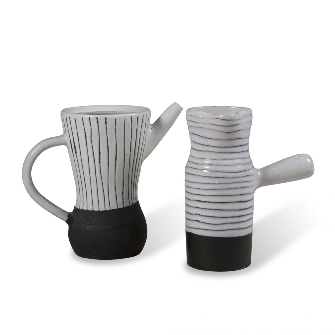 Two Pitchers by Jacques Innocenti: Two pieces: in main photo, on left) Black and white glazed ceramic pitcher, white with thin black vertical stripes, the lower portion solid black, by Jacques Innocenti, French 1950s. Signed. H 7.9 in.