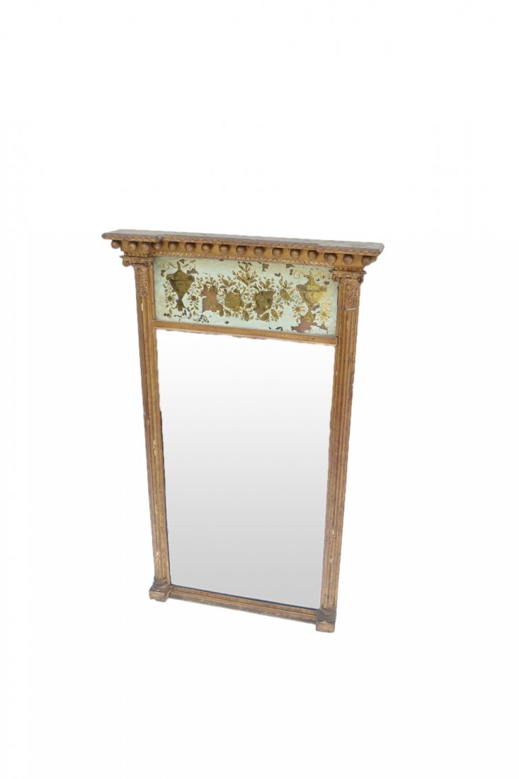 Gilded Pier Mirror: Neoclassical style gilded pier mirror with hand painted neoclassical ornamentation. [22 1/4" W x 3 3/4" D x 37 1/4" H]. Loss to paint and gilding, scratches, worn condition.