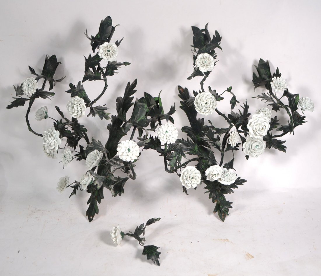 Pair Floral Tole Sconces: Green, white decorated sconces. [16" W x 6" D x 15 1/4" H]. Overall good condition.