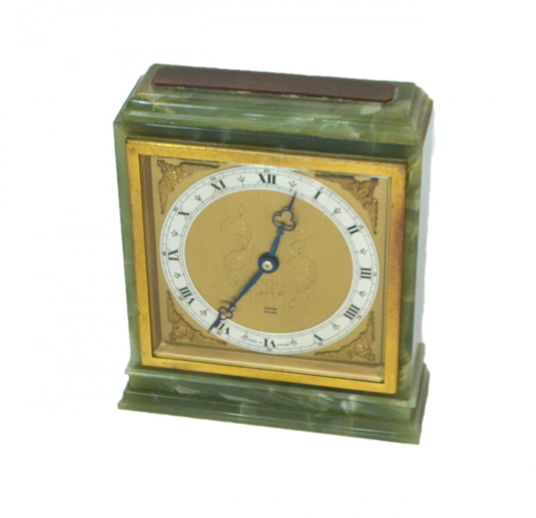 Elliot Onyx Mantle Clock: English green onyx clock with gilt raised and decorated face. Marked Elliot, London. Movement not tested. Good condition.