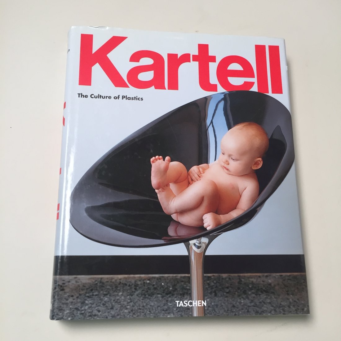 Kartell The Culture of Plastic: Published by Taschen 2012. Very good condition. The Italian company Kartell is famous for having pioneered the culture of plastic furniture and interior fittings in Europe and around the world, and th