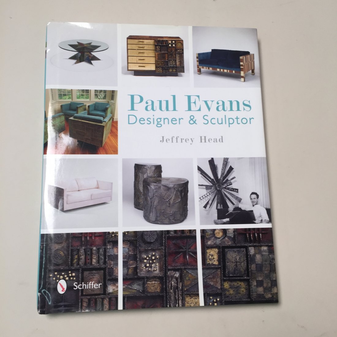 Paul Evans Designer and Sculptor: by Jeffrey Head. Published by Schiffer. Hardcover. Very good condition.