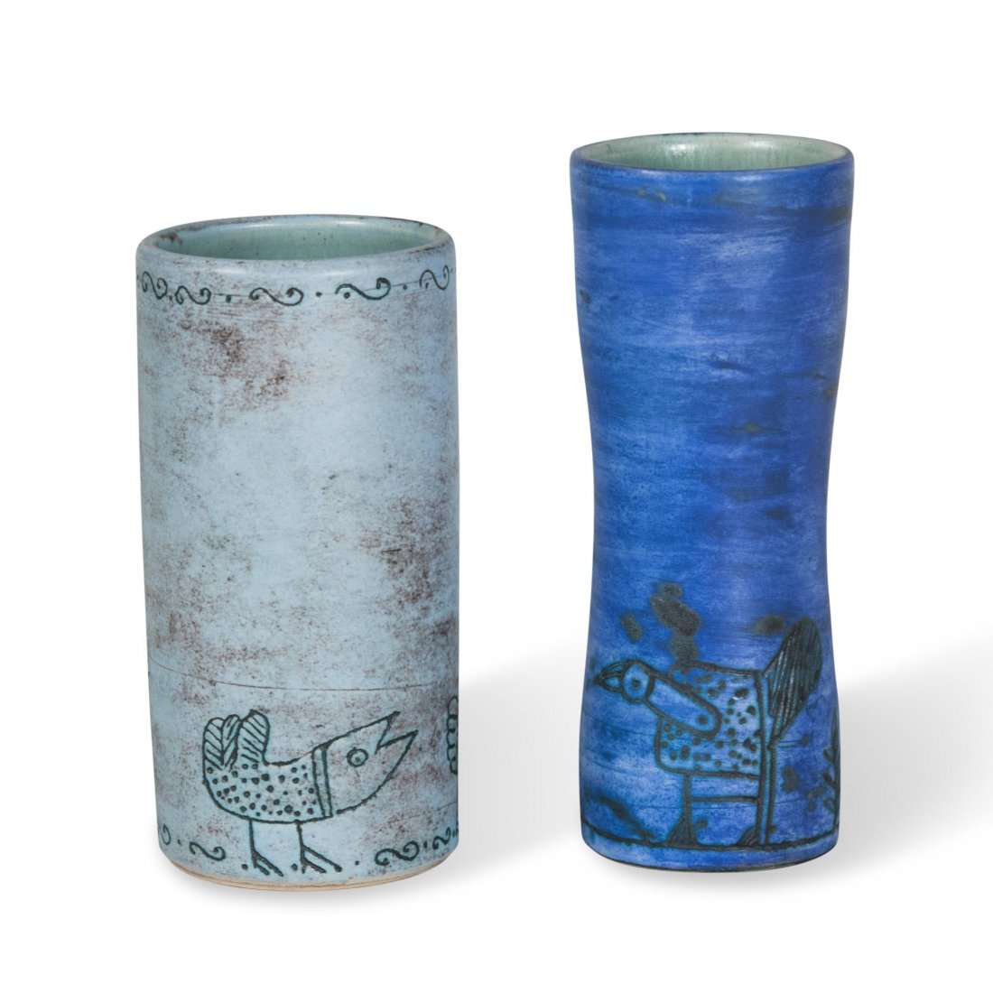 Two Jacques Blin Vases: Two ceramic vases with primitive style sgraffito decoration, in pale and dark blue glaze, by Jacques Blin, French 1950s. Incised signature to underside. Height 7 in and 8 in.
