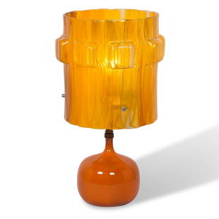 Ruelland Ceramic Lamp: Orange ceramic bulbous shaped lamp in orange glaze with matching original custom made shade orange molded plastic shade by Jacques and Dani Ruelland, French 1960s. Signed to underside. 17" H x 6â€