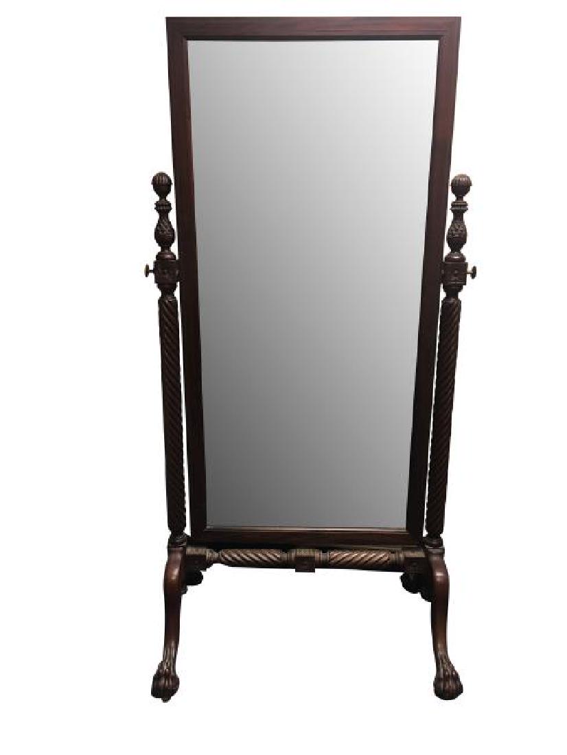 Antique Carved Mahogany Cheval Mirror: Antique Carved Mahogany Cheval Mirror on paw feet, 32 x 23 x 68 inches H, Brass inlay, Beveled mirror