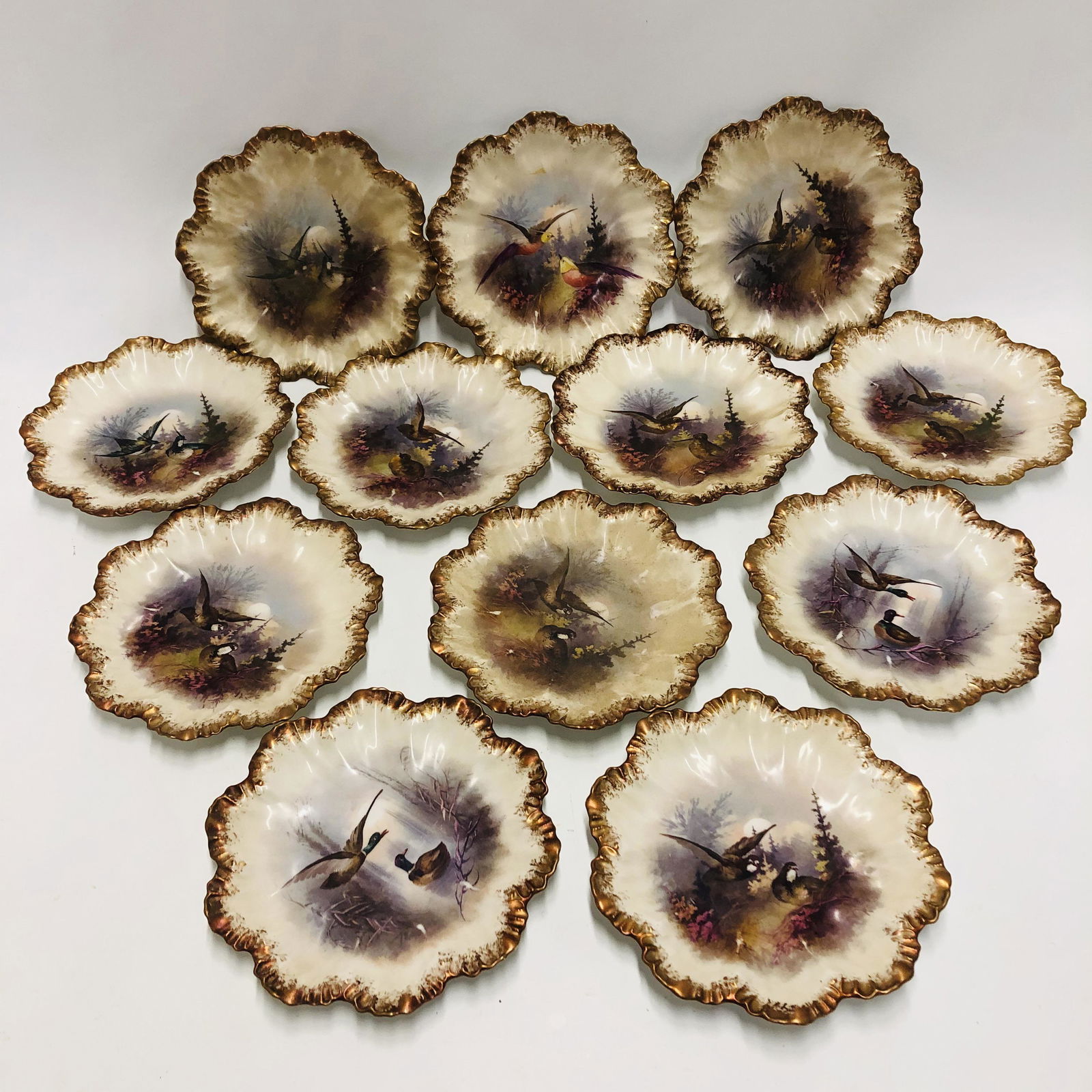 Set of Twelve Limoges game bird plates, scalloped (1 of 6)