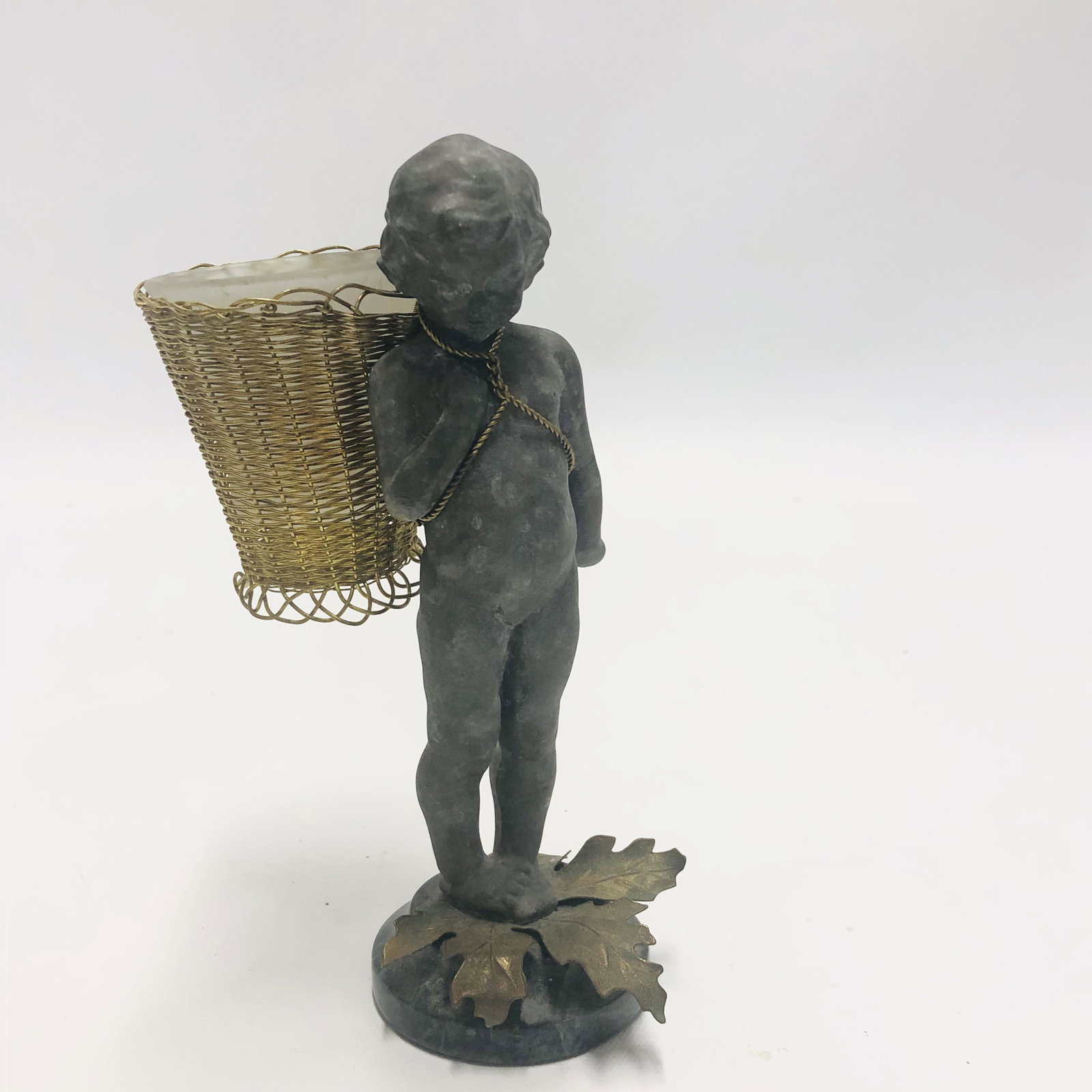 Victorian Putti with brass wire basket, glass insert: Victorian Putti with brass wire basket, glass insert