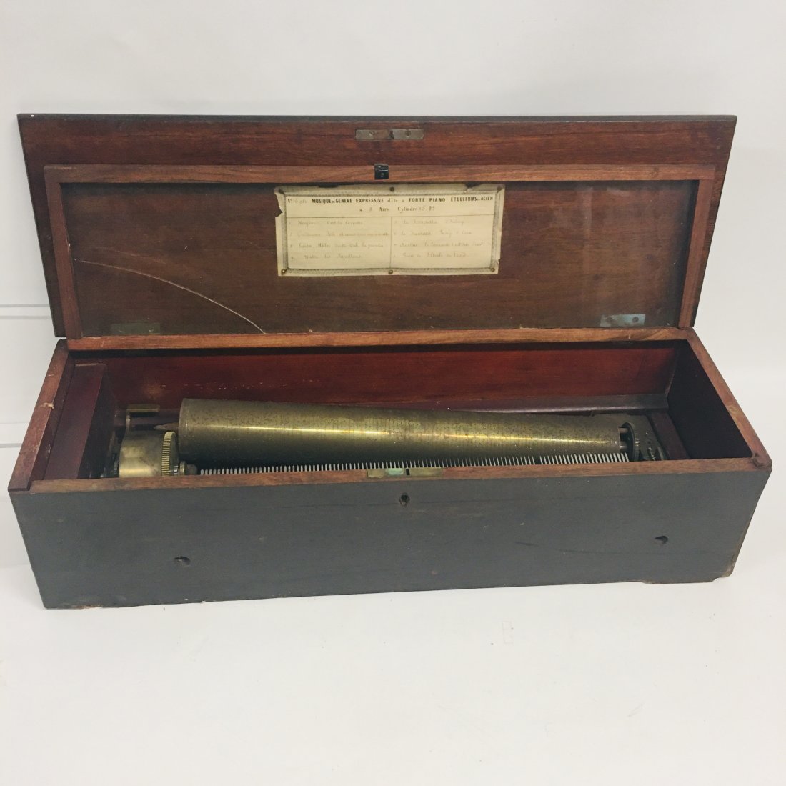 19th Century 8-Tune Cylinder Music Box: Antique 19th Century 8-Tune Cylinder Music Box, measures approx. 24.5 x 8 x 6.75 inches, original label inside, inlaid case, untested, as is condition