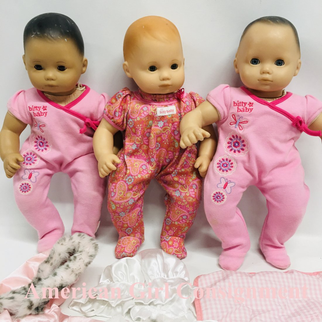 American Girl Set of Three Bitty Baby Dolls: American Girl Set of Three Bitty Baby Dolls with Outfits ------------------ please review all pictures carefully because they are part of the description and show condition issues if any