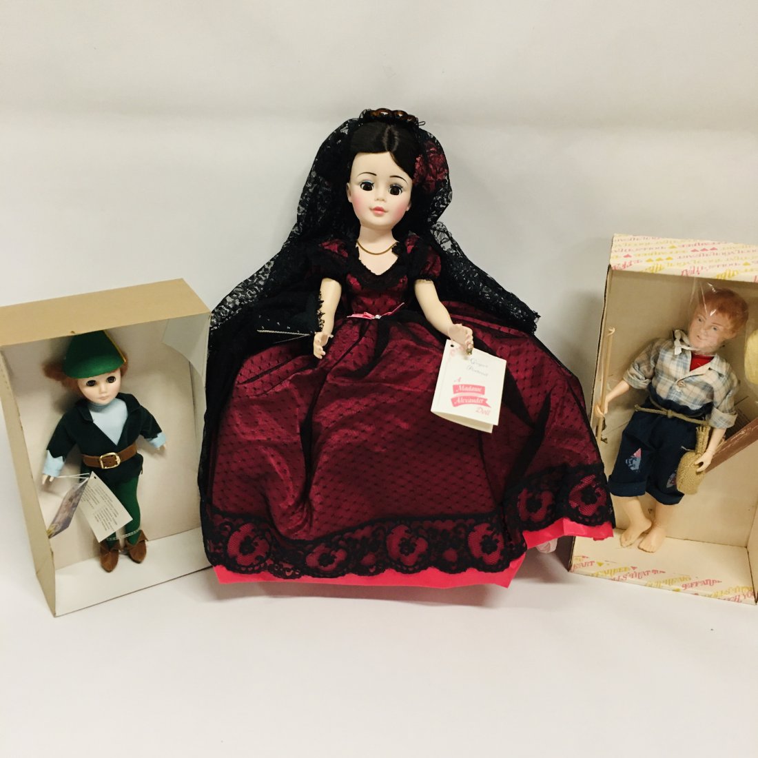 Madame Alexander and Effanbee Dolls: Madame Alexander Goya 2235 and Effanbee Dolls, 1197 Peter Pan and 7632 Huck Fin ------------------ please review all pictures carefully because they are part of the description and show condition issu