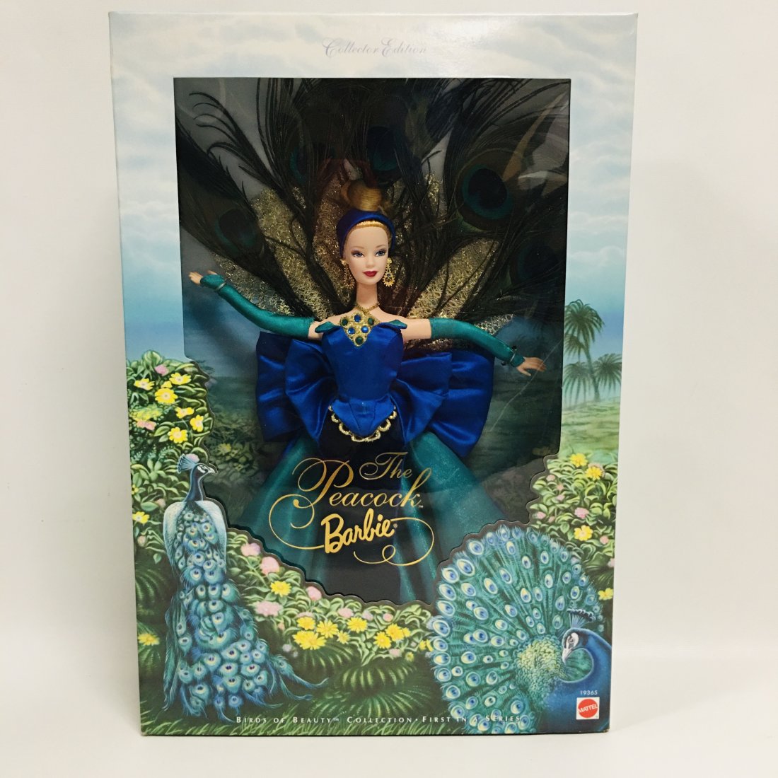 The Peacock BARBIE Doll: Birds of Beauty collection ------------------ please review all pictures carefully because they are part of the description and show condition issues if any ------------------ Consider the shipping fe