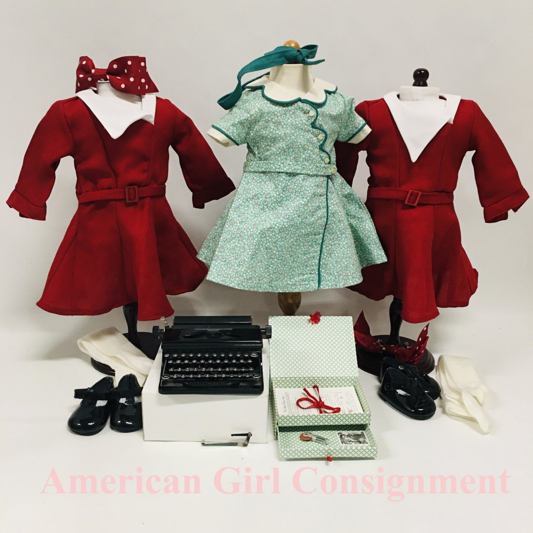 American Girl Doll Kit Christmas, Birthday Dresses and Headband: American Girl Doll Kit Two Christmas dresses, Birthday Dress with Headband. Typewriter missing handle and one red ribbon missing clip. ------------------ please review all pictures carefully because t