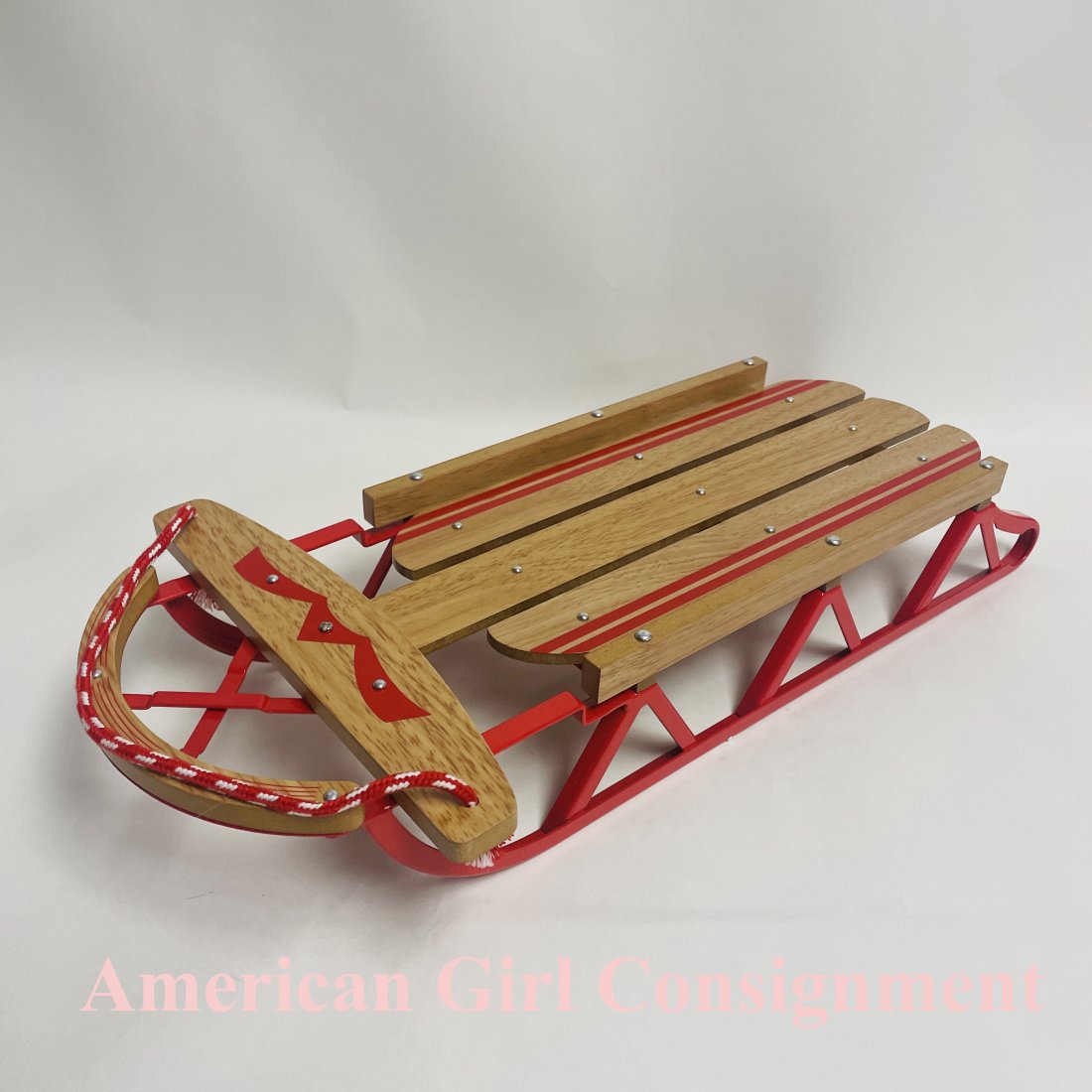 American Girl Doll Emily Wooden Sled with Box: American Girl Doll Emily Wooden Sled with Box. Box top with cut outs. ------------------ please review all pictures carefully because they are part of the description and show condition issues if any 