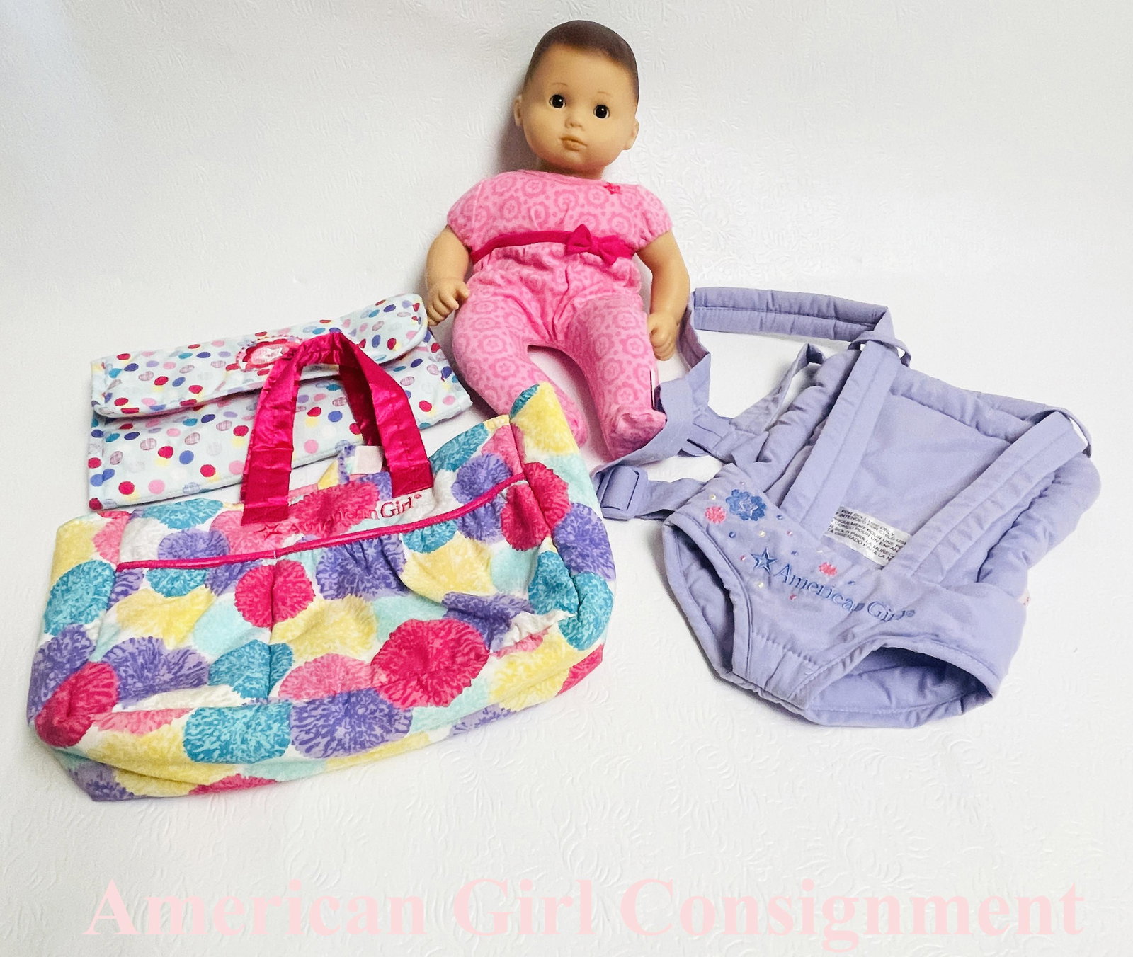 American Girl Bitty Baby Brunette Doll and Several Carriers: American Girl Bitty Baby Brunette Doll and Several Carriers ------------------ please review all pictures carefully because they are part of the description and show condition issues if any ----------