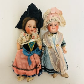 Two small Antique Bisque Head Dolls