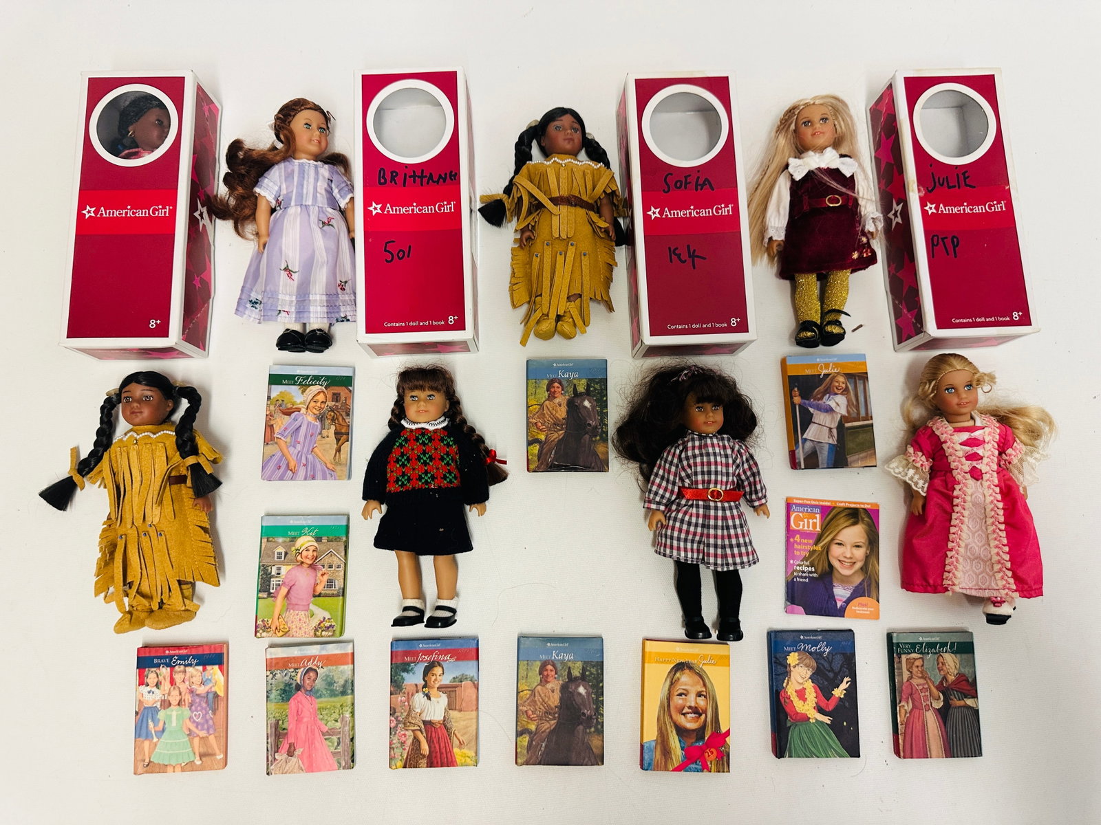 Group of Seven American Girl Mini Dolls, some with Boxes: Group of Seven American Girl Mini Dolls, some with Boxes ------------------ please review all pictures carefully because they are part of the description and show condition issues if any -------------