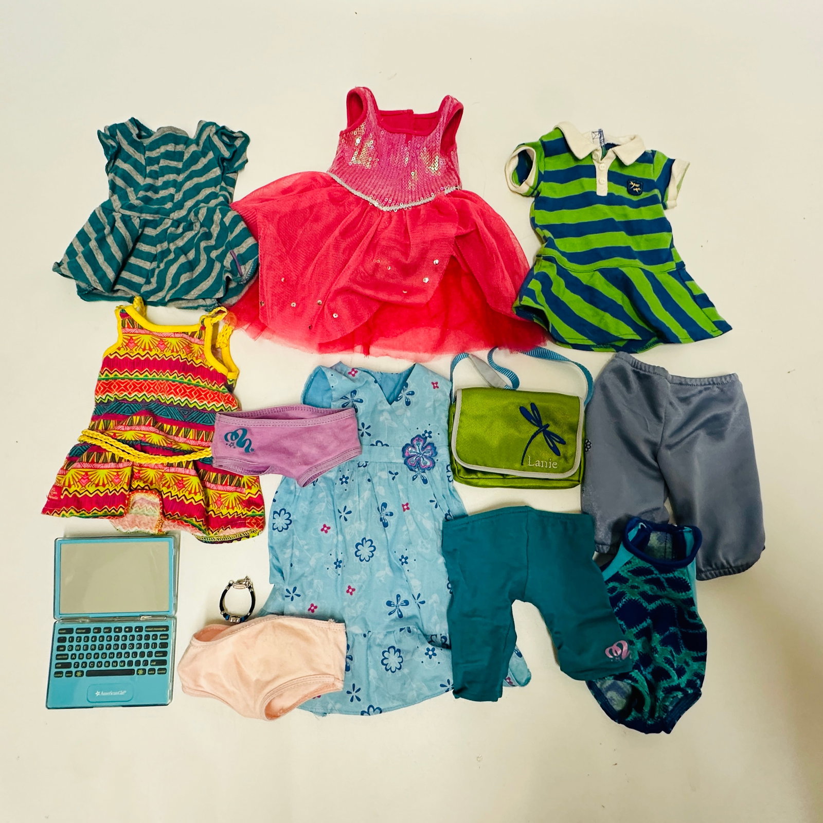 American Girl Doll GOTY Clothes: Isabelle, Lanie, Kanani and Lea: American Girl Doll GOTY Clothes: Isabelle, Lanie, Kanani and Lea ------------------ please review all pictures carefully because they are part of the description and show condition issues if any -----