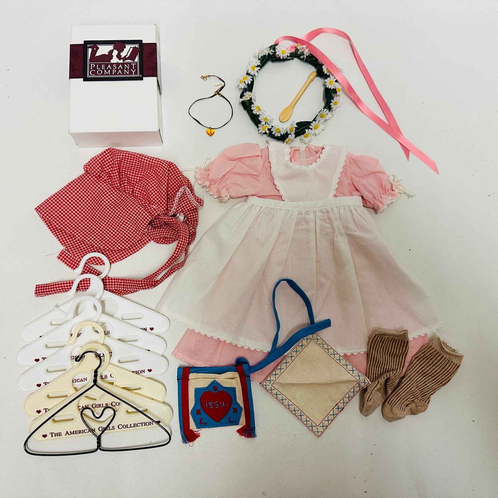 American Girl Doll Kirsten Apron Dress, Daisy Wreath and Meet Accessories: American Girl Doll Kirsten Apron Dress, Daisy Wreath and Meet Accessories ------------------ please review all pictures carefully because they are part of the description and show condition issues if 
