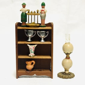 Shackman Bookcase with German Figures and Table Lamp
