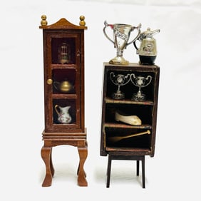 Two Cabinets with Porcelain and Silver Loving Cups
