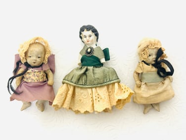 Group of All Bisque Dollhouse Dolls and Frozen Charlotte