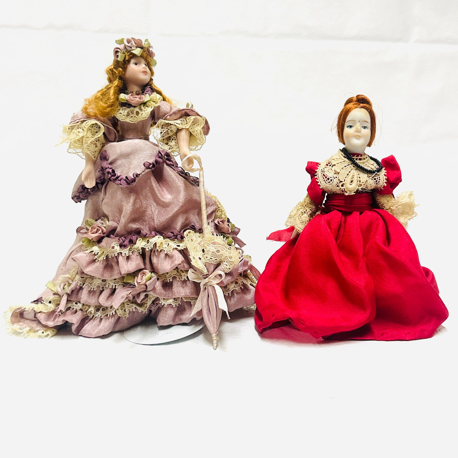 Two Porcelain Dollhouse Lady Dolls: Two Porcelain Dollhouse Lady Dolls ------------------ please review all pictures carefully because they are part of the description and show condition issues if any ------------------ please consider 