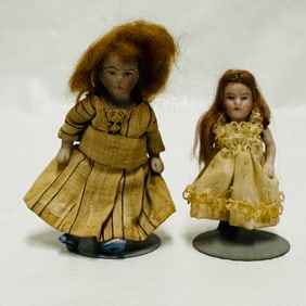 Two Antique All Bisque Dollhouse Dolls