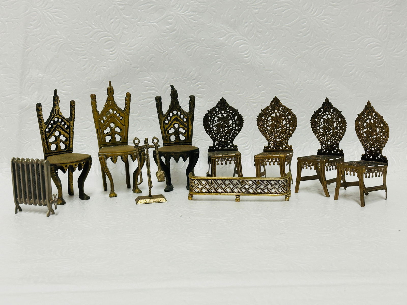 Grouping of Brass Chairs and Fireplace Fender (1 of 7)