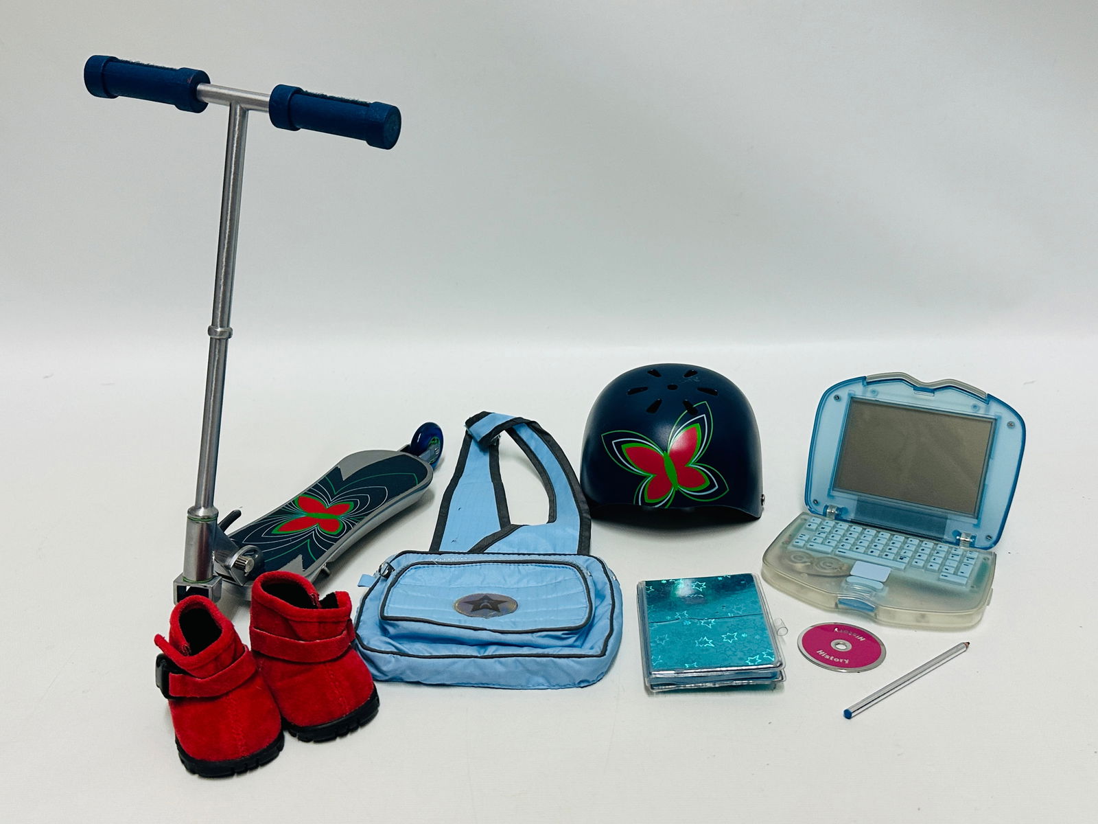 American Girl Doll Lindsey Bergman Scooter, Laptop and Helmet: American Girl Doll Lindsey Bergman Scooter, Laptop and Helmet ------------------ please review all pictures carefully because they are part of the description and show condition issues if any --------