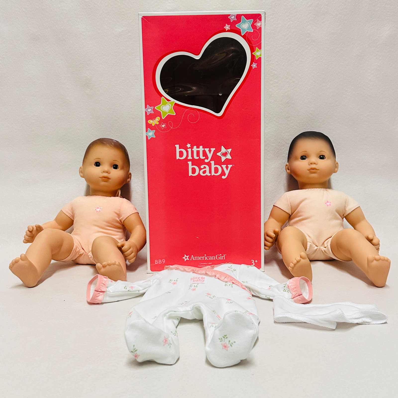 Two American Girl Bitty Baby Dolls: Two American Girl Bitty Baby Dolls ------------------ please review all pictures carefully because they are part of the description and show condition issues if any ------------------ please consider 