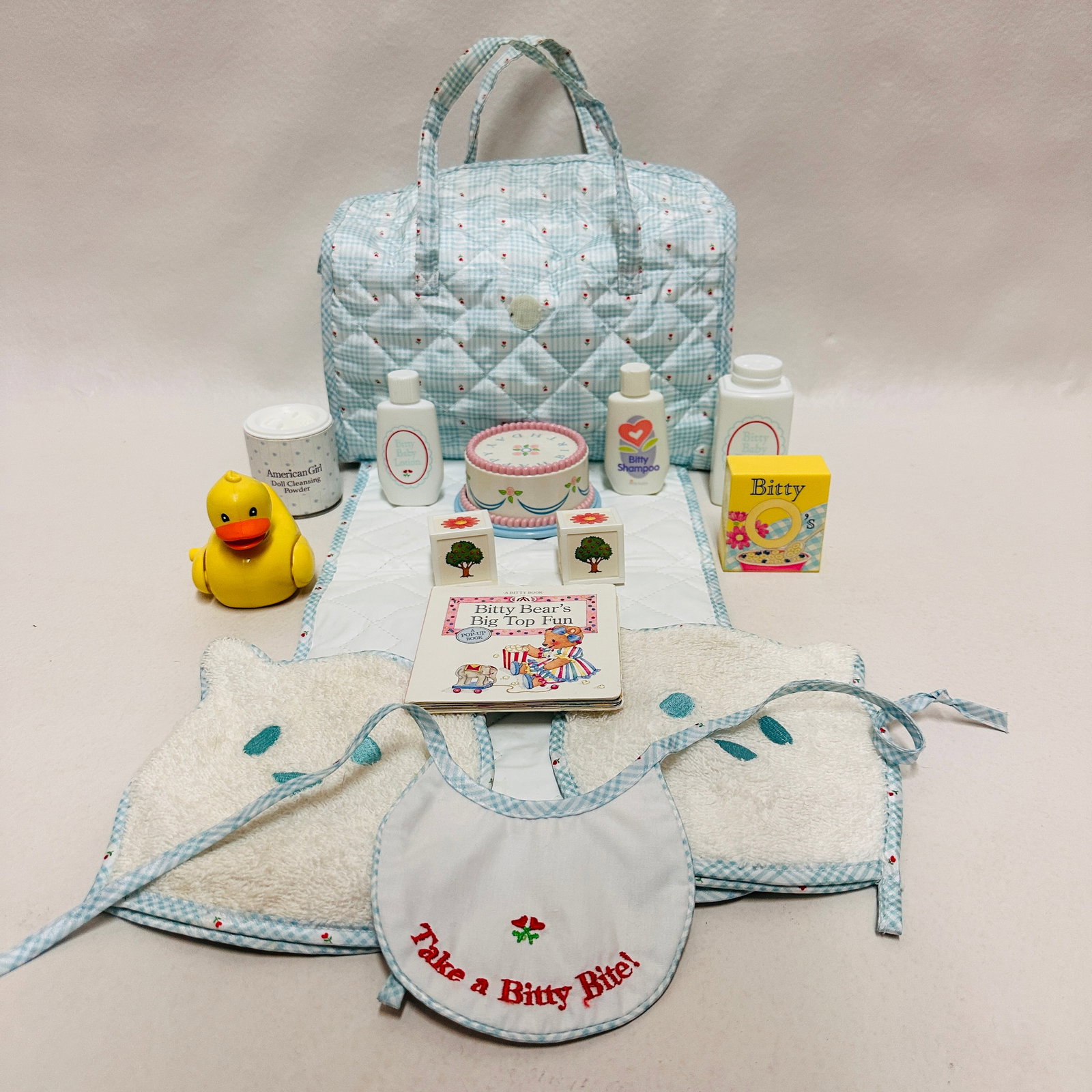 American Girl Bitty Baby Doll Diaper Bag with Contents: American Girl Bitty Baby Doll Diaper Bag with Contents ------------------ please review all pictures carefully because they are part of the description and show condition issues if any ---------------