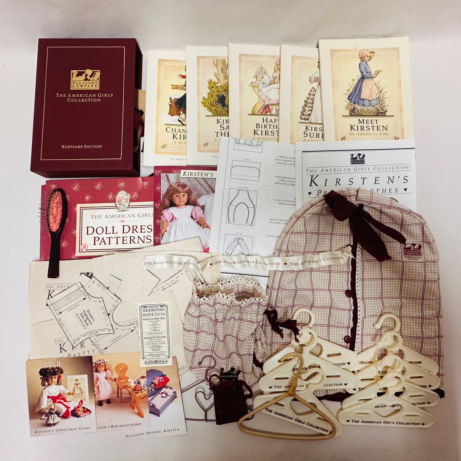 American Girl Doll Kirsten Historical Book Set, Garment Bag and more: American Girl Doll Kirsten Historical Book Set, Garment Bag and more ------------------ please review all pictures carefully because they are part of the description and show condition issues if any -
