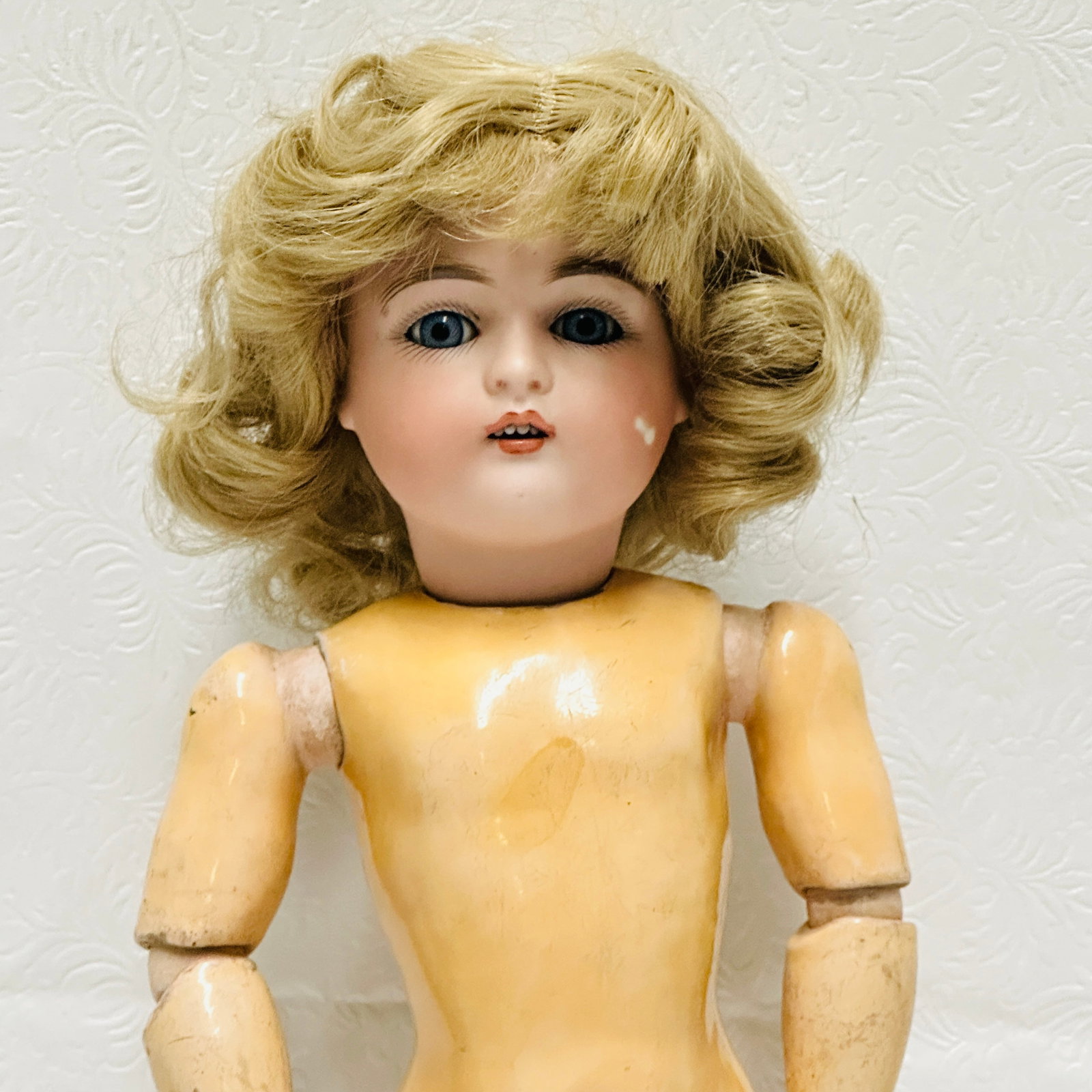 Antique German 167 Bisque Head Doll: Antique German 167 Bisque Head Doll, Kestner mold 167, paint loss on her left cheek, nice older child body with original paint, open mouth with four teeth, sleep eyes. Original plaster pate and replac