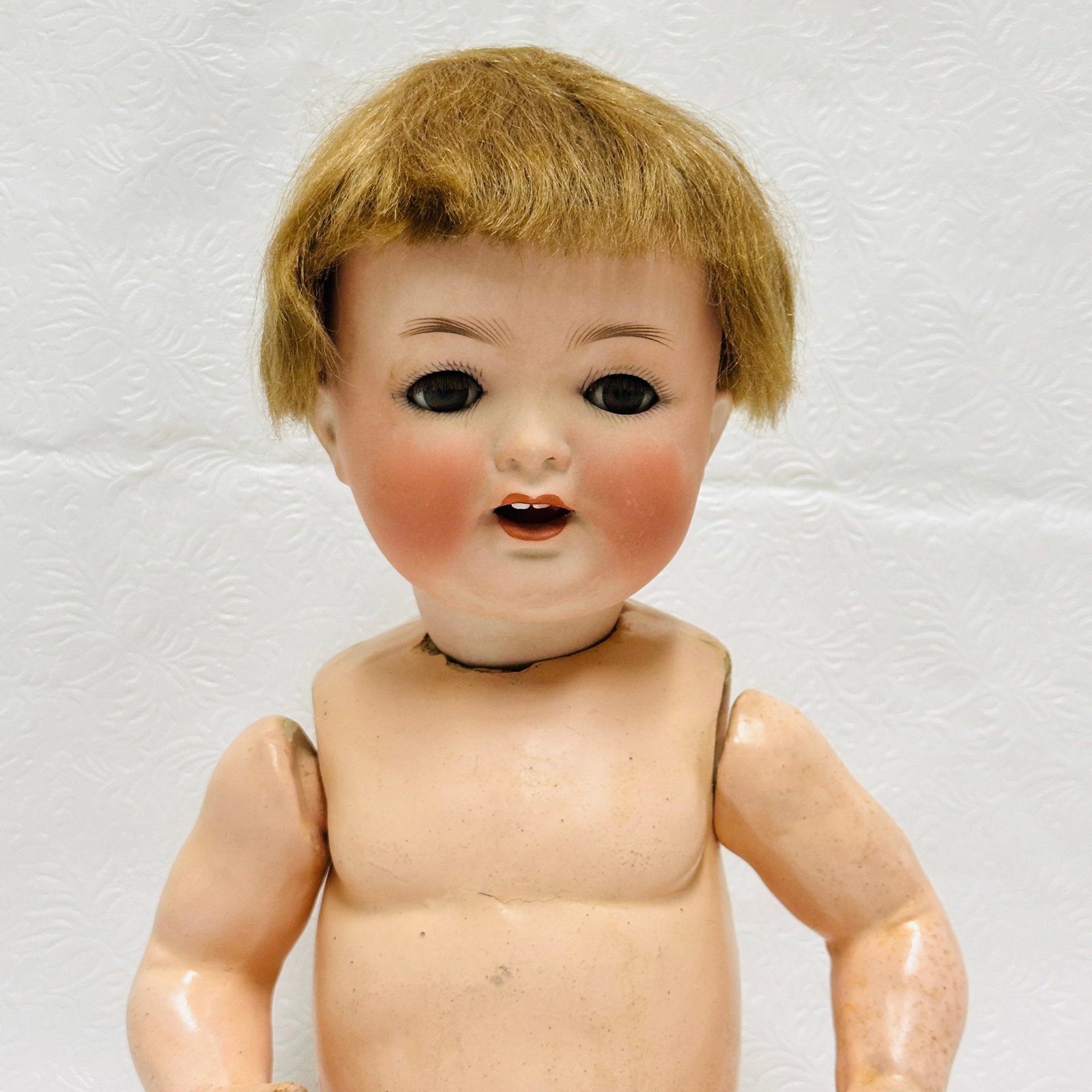 Heubach Koppelsdorf Antique Baby Doll with socket head: Heubach Koppelsdorf Antique Baby Doll with socket head, Laughing baby face with two teeth and dark blue sleep eyes with eyelashes, rosy cheeks, original mohair toddler wig. Wood and compo toddler body