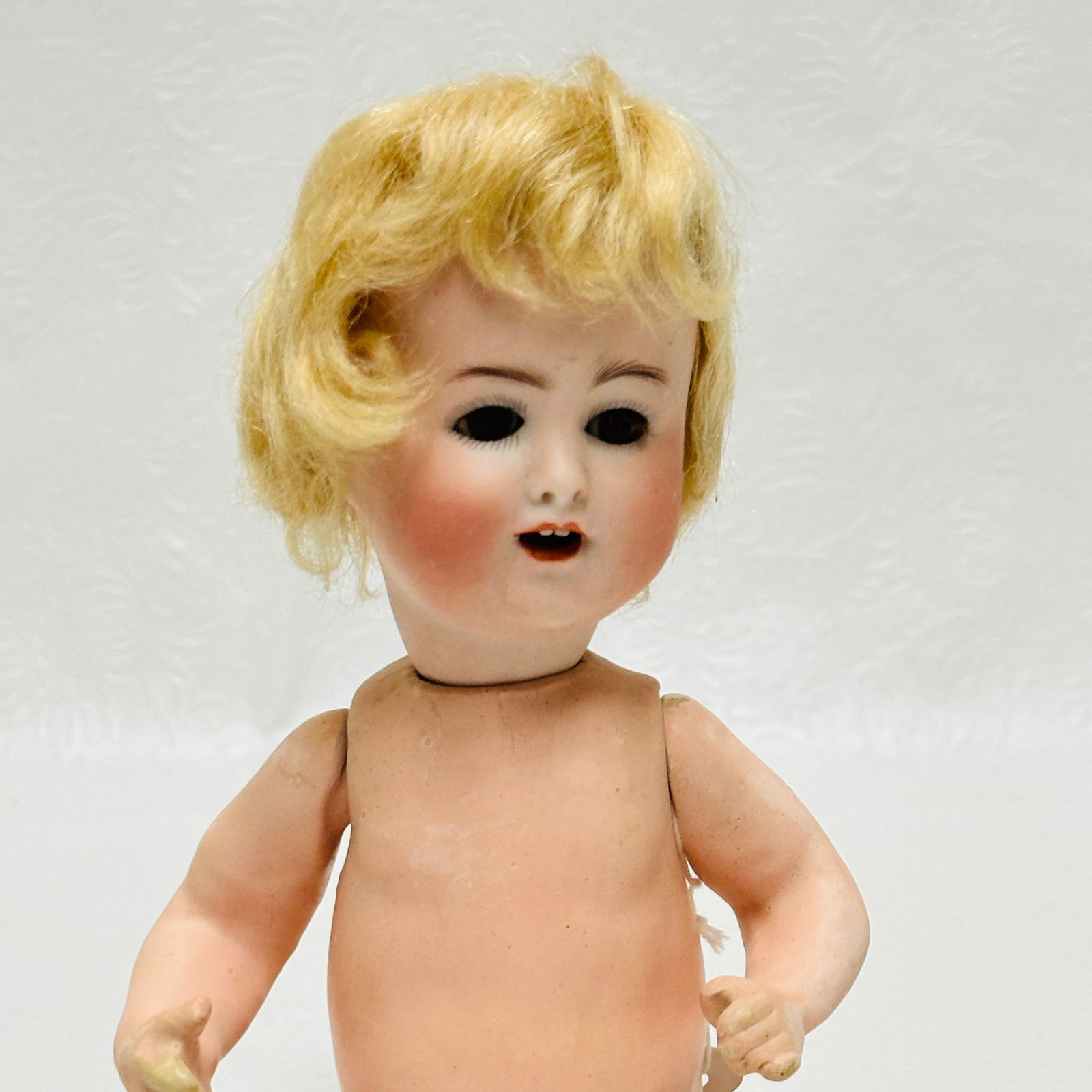 Alt, Beck and Gottschalk Character all Bisque Doll: Alt, Beck and Gottschalk Character all Bisque Doll, Character faced laughing doll with high color, dark blue sleep eyes, open laughing mouth with two teeth, toddler body with some wear on extermities