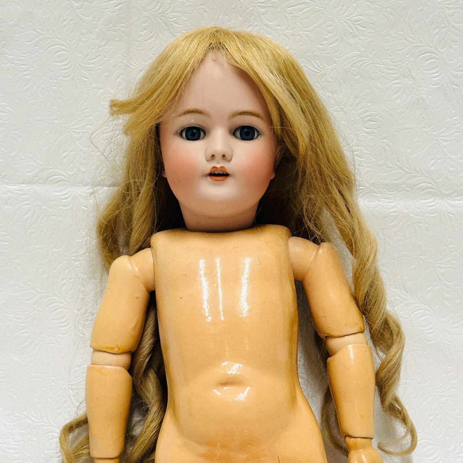 Antique German Handwerck Bisque Head Doll with Stamped Body: Antique German Handwerck Bisque socket Head Doll with Stamped jointed composition Body, Very sweet faced girl with dark blue sleep eyes and heart shaped open mouth with teeth, slight chip over her rig