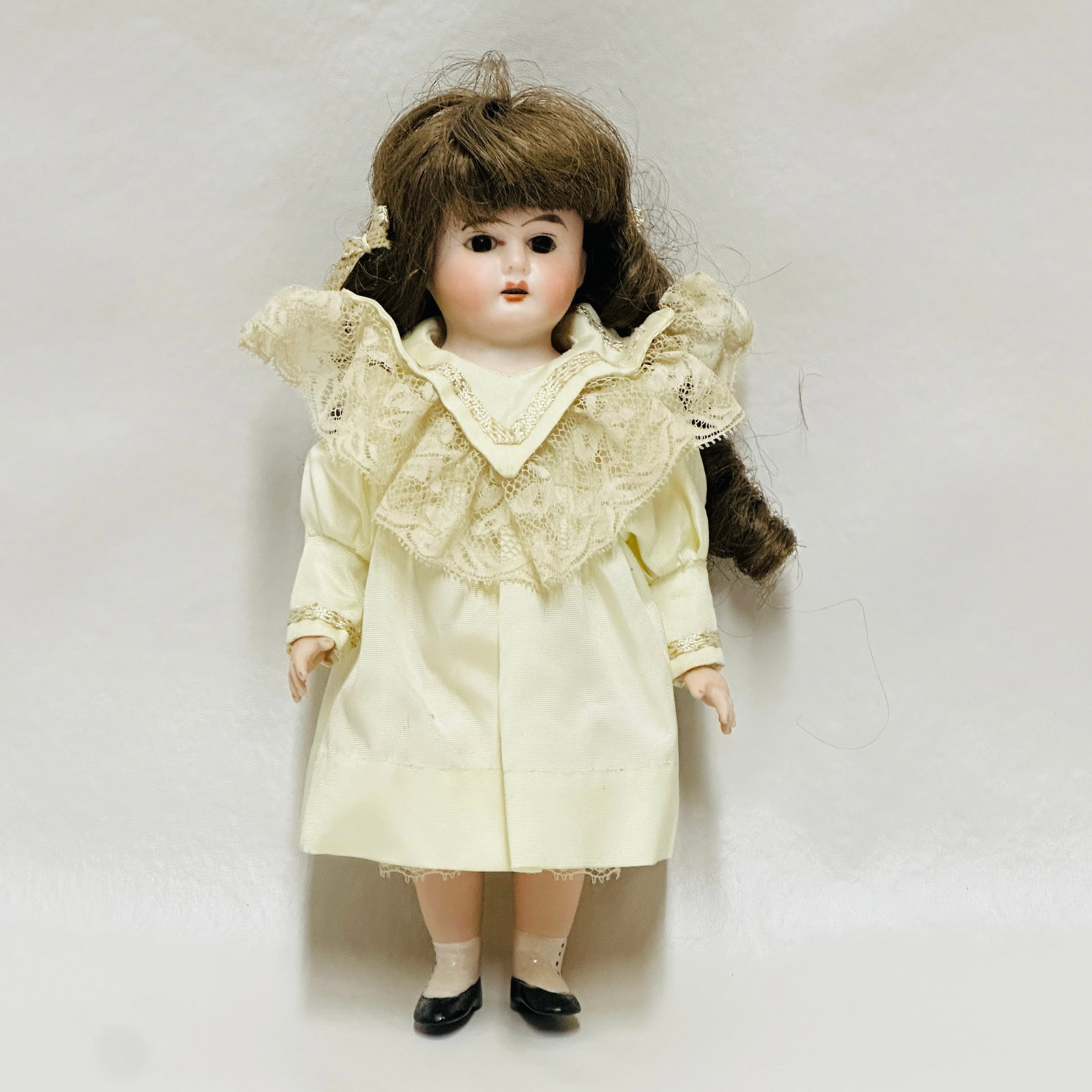 Bisque Shoulder Head Doll with Horseshoe Mark: Painted shoes with button boots, dark brown eyes and open mouth, Replaced wig and costume, Bisque Shoulder Head Doll with open mouth, last picture with hard to see Horseshoe Mark ------------------ pl