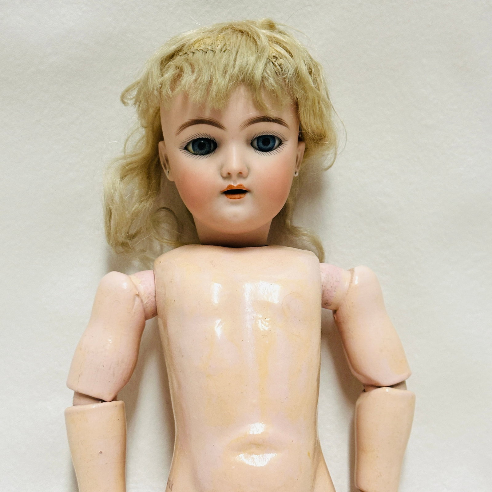 Antique German Handwerck 109 Bisque Head Doll: Handwerck 109 -7 1/2 Beautiful face with large blue sleep eyes, open mouth with teeth, earring holes with small chips, original mohair wig. On wood and composition body with replaced hands, Antique Ge