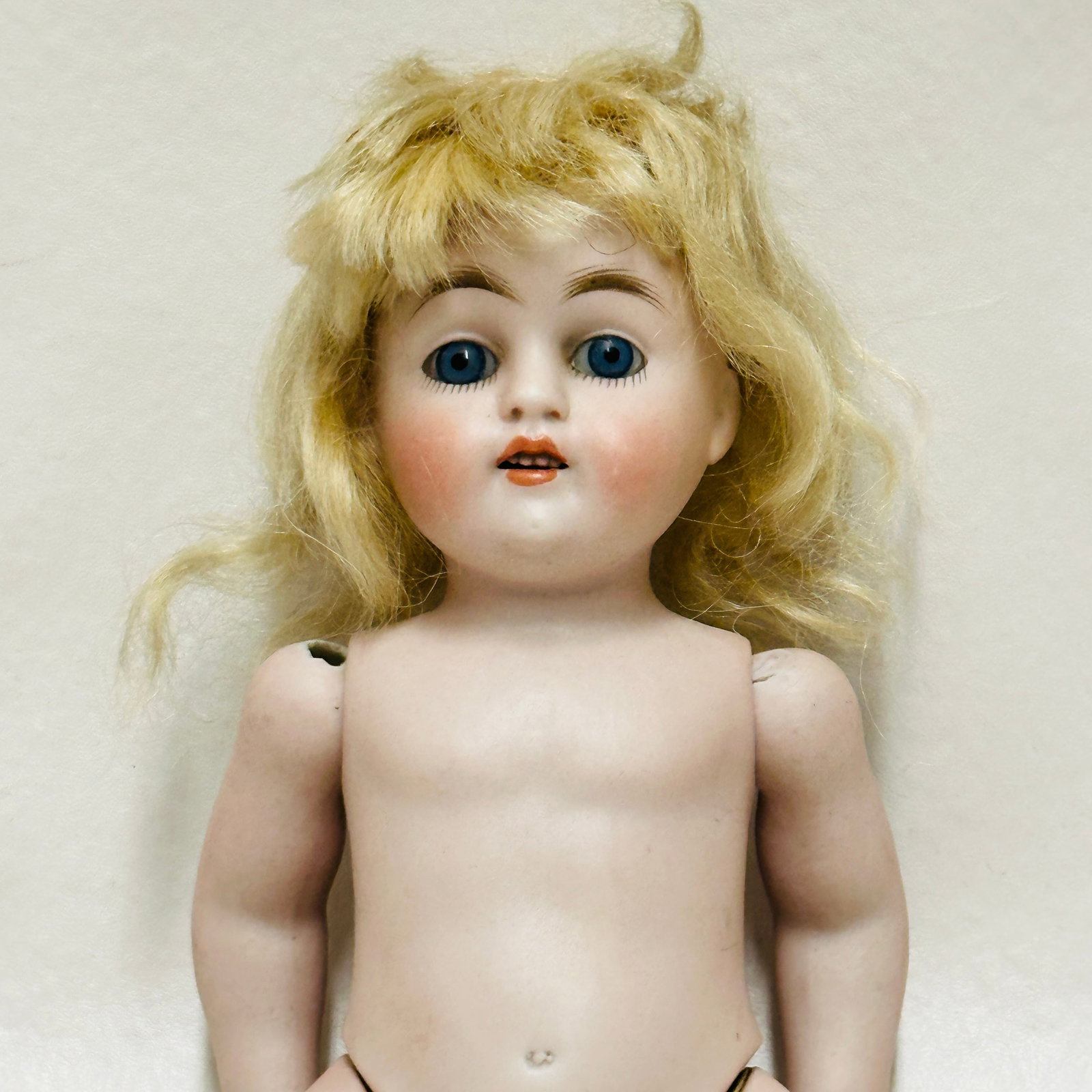 Kestner 150 Antique All Bisque Doll: Kestner 150 with blue sleep eyes, open mouth with four teeth, original mohair wig, and attached pate, painted socks and shoes, chips to both shoulder holes (one repaired), Antique All Bisque Doll, The