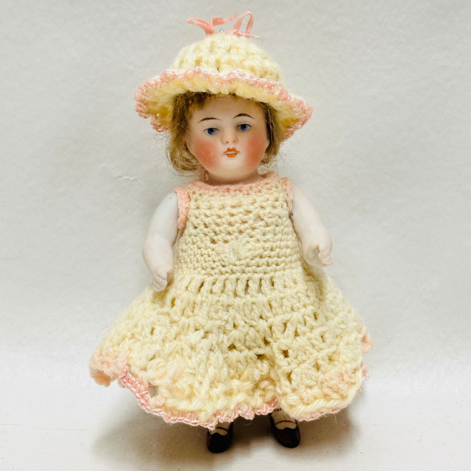 All Bisque Doll in crochet dress: Blue painted eyes, single stroke eyebrows, open closed mouth, original mohair wig, mommy made crochet costume, All Bisque Doll in crochet dress ------------------ please review all pictures carefully