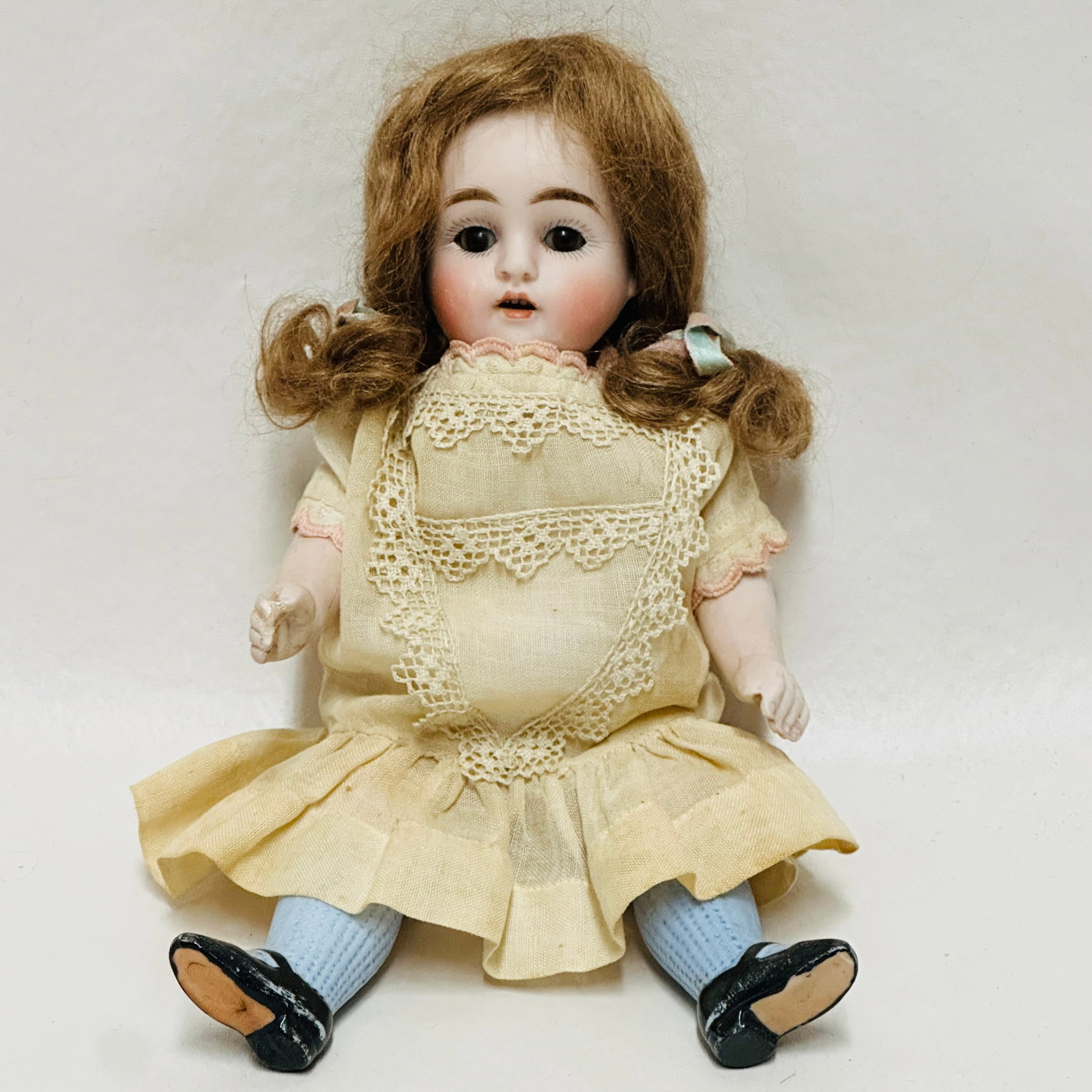 Antique All Bisque Doll marked 150: Probably Kestner marked 150, Brown sleep eyes, open mouth with four teeth, painted shoes and socks with stripe, original brunette mohair wig, vintage costume , Antique All Bisque Doll ----------------