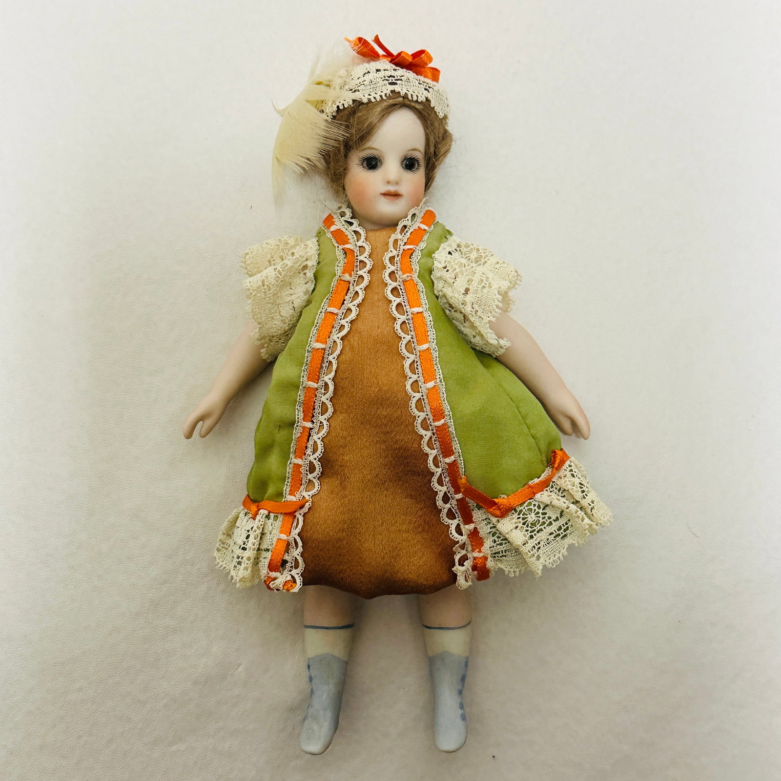 S. Antoon 1996 all porcelain Doll: S.(Shirley) Antoon, Head and arms appear to be reproduction, legs appear to be antique, pretty face with nice painting and blue glass eyes, mohair wig, painted boots and socks with stripe, modern cost