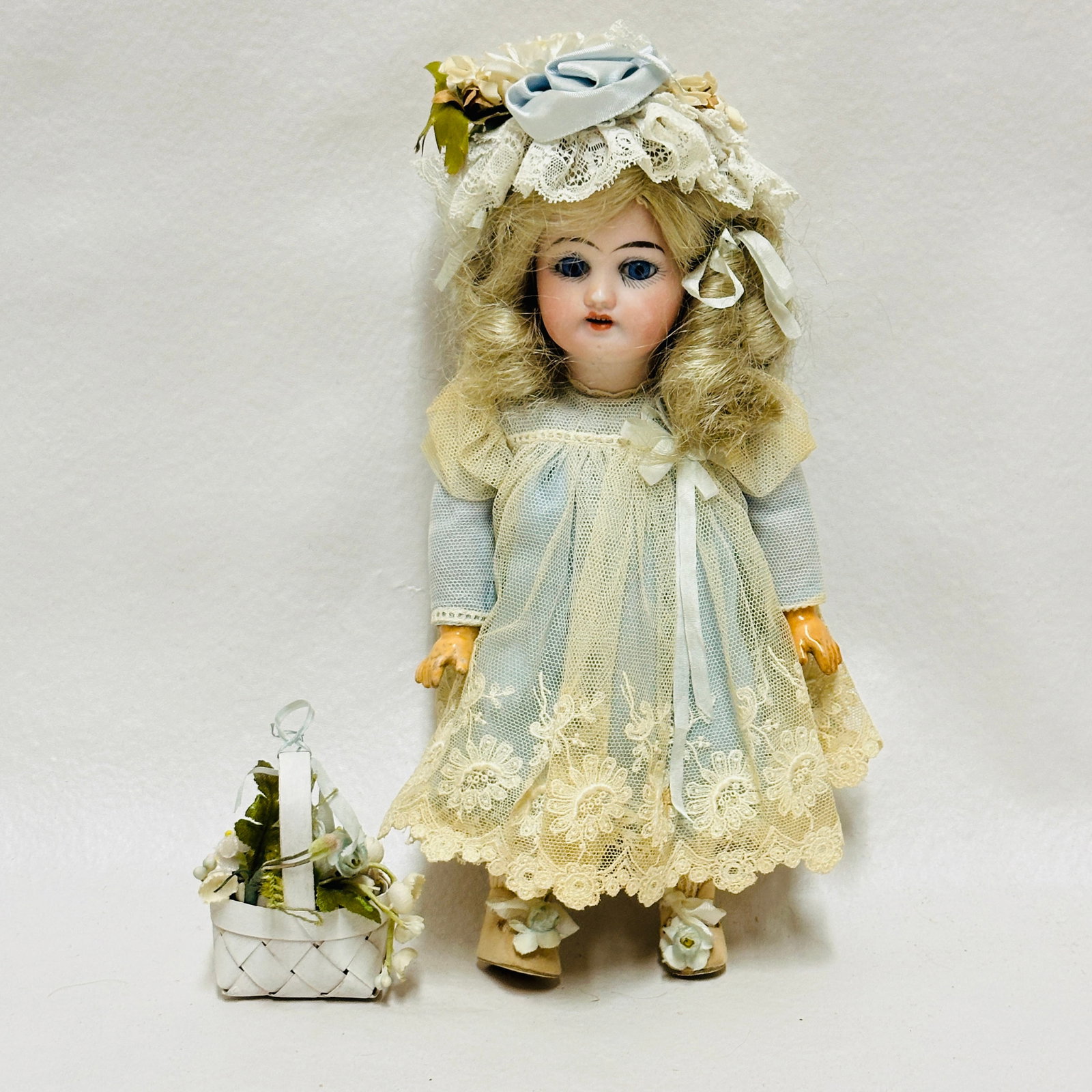 Bisque Head Doll DEP may be Recknagel: Bisque Head Doll DEP, may be Recknagel, Dark blue sleep eyes, nose rub, open mouth with teeth, single stroke eyebrows, replaced wig, on composition body, replaced costume of nice antique fabrics -----