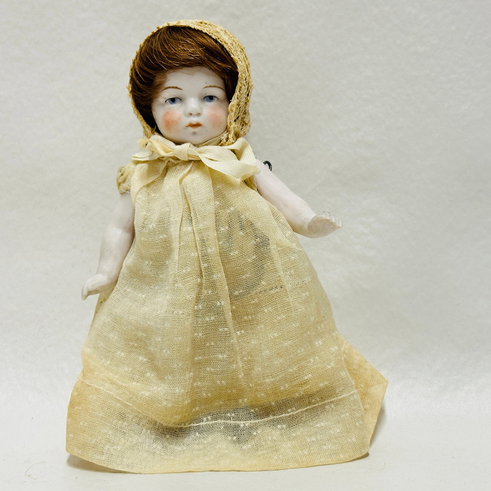 All Bisque Dollhouse Baby Doll, Marked: Painted eyes, pursed mouth, original full baby wig, original costume,painted boots with socks and stripe, All Bisque Dollhouse Baby Doll ------------------ please review all pictures carefully because