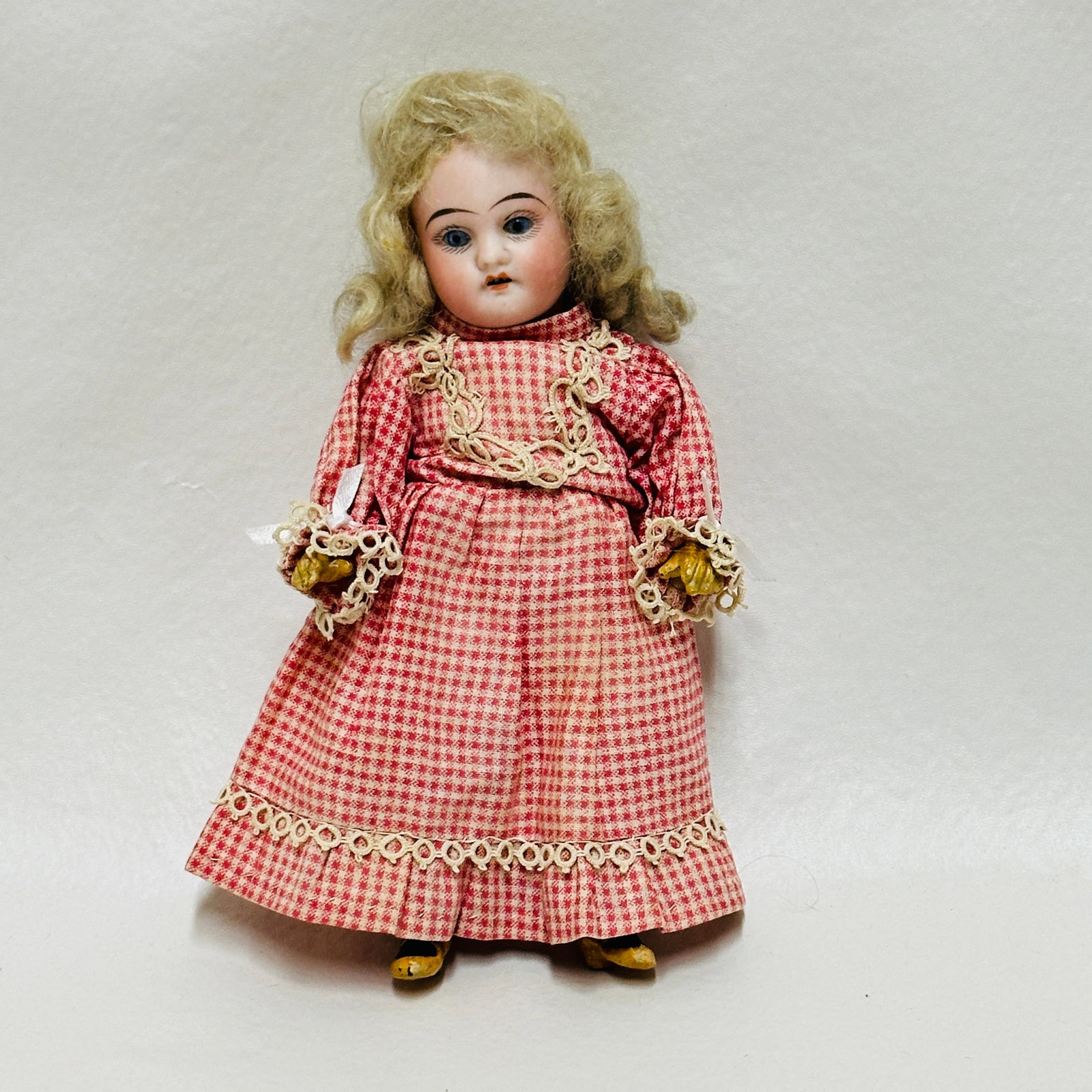 German Bisque Head Doll with Composition Girl Body: Blue sleep eyes, open mouth with teeth, sad expression, original mohair wig on compo body with painted shoes and socks, original costume, German Bisque Head Doll with Composition Girl Body -----------