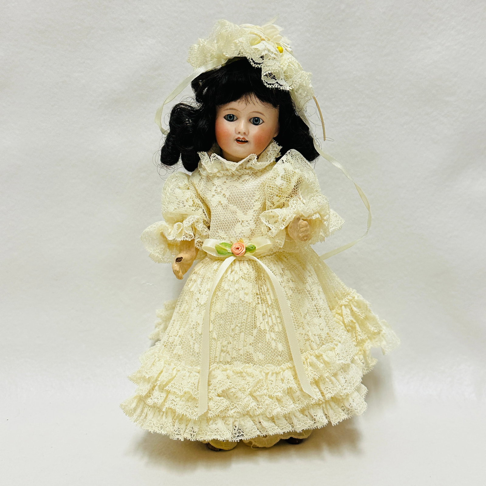 Antique Unis France 60 Bisque Head Doll: Unis France 60 Blue sleep eyes, open mouth with teeth, single stroke brows, replaced wig on composition body with one thumb chipped, painted shoes with one foot chipped, replacement dress, Antique Uni