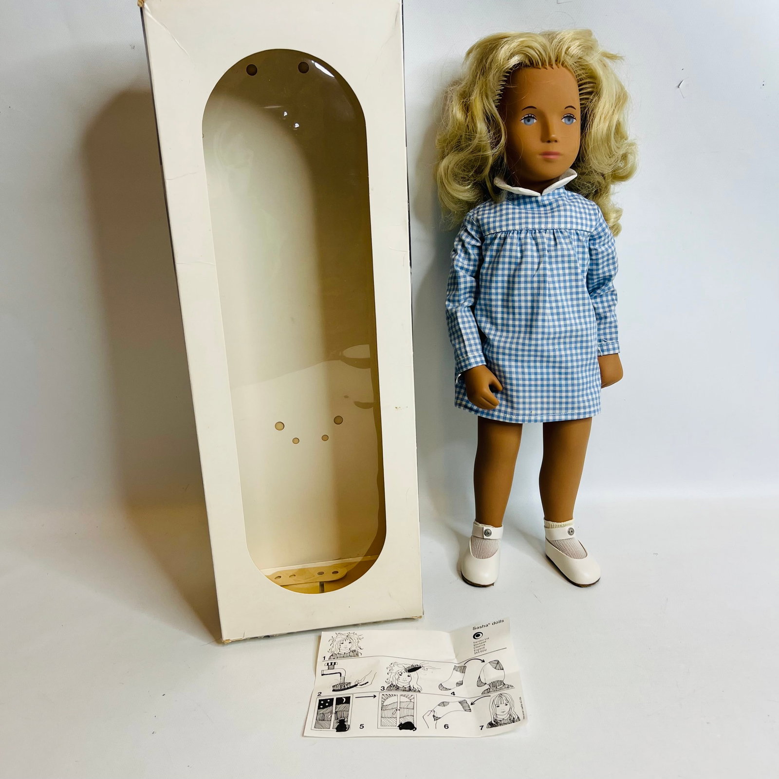 Doll 107 Sasha Blonde Gingham: Doll 107 Sasha Blonde Gingham ------------------ please review all pictures carefully because they are part of the description and show condition issues if any ------------------ please consider the s