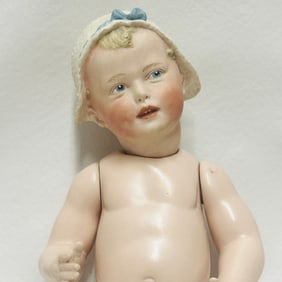Molded on Bonnet Gebruder Heubach Doll with Baby Body