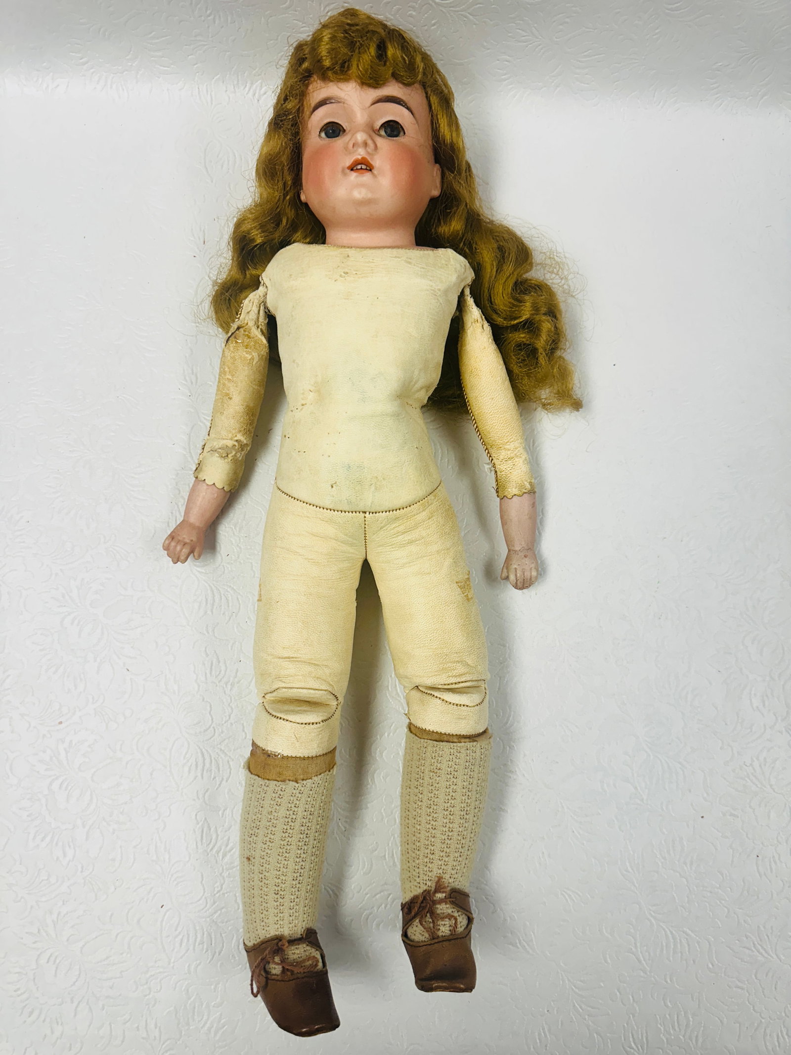 Antique Bisque Head Majestic Doll: Antique Bisque Head Majestic Doll, body with small tears ------------------ please review all pictures carefully because they are part of the description and show condition issues if any -------------