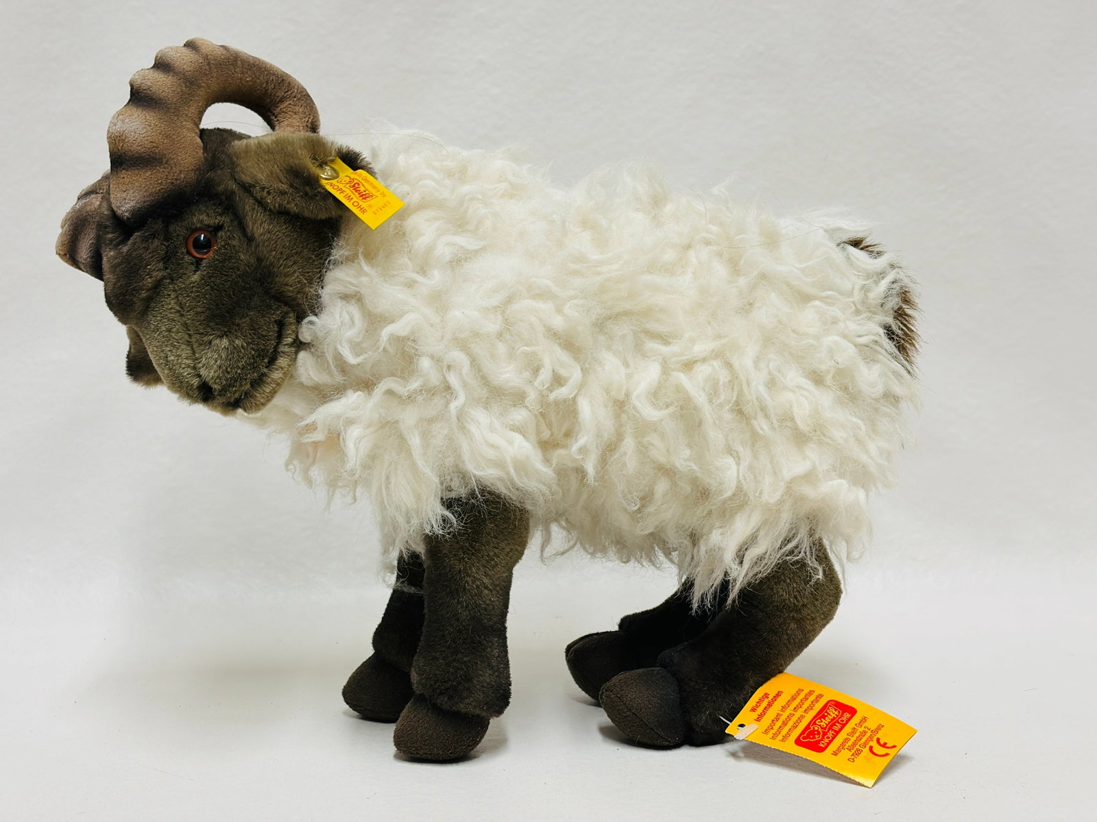 Steiff Mountain Sheep Snucki: Steiff Mountain Sheep Snucki ------------------ please review all pictures carefully because they are part of the description and show condition issues if any ------------------ please consider the